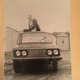 Alexander Petrovych copping-a-squat on one of his very sturdy cars. Yura contends that every Soviet homemade car builder has a picture like this.